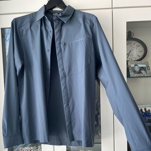 Blue arcteryx button up sun protecting long sleeve